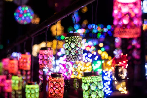 A diverse group of happy customers enjoying sweets.